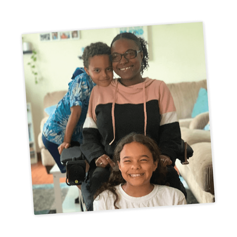 Jasmine, living with SMA and her family